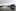 Traffic crossing flood water caused by torrential rain between Wallacetown and Invercargill. Photo / NZPA