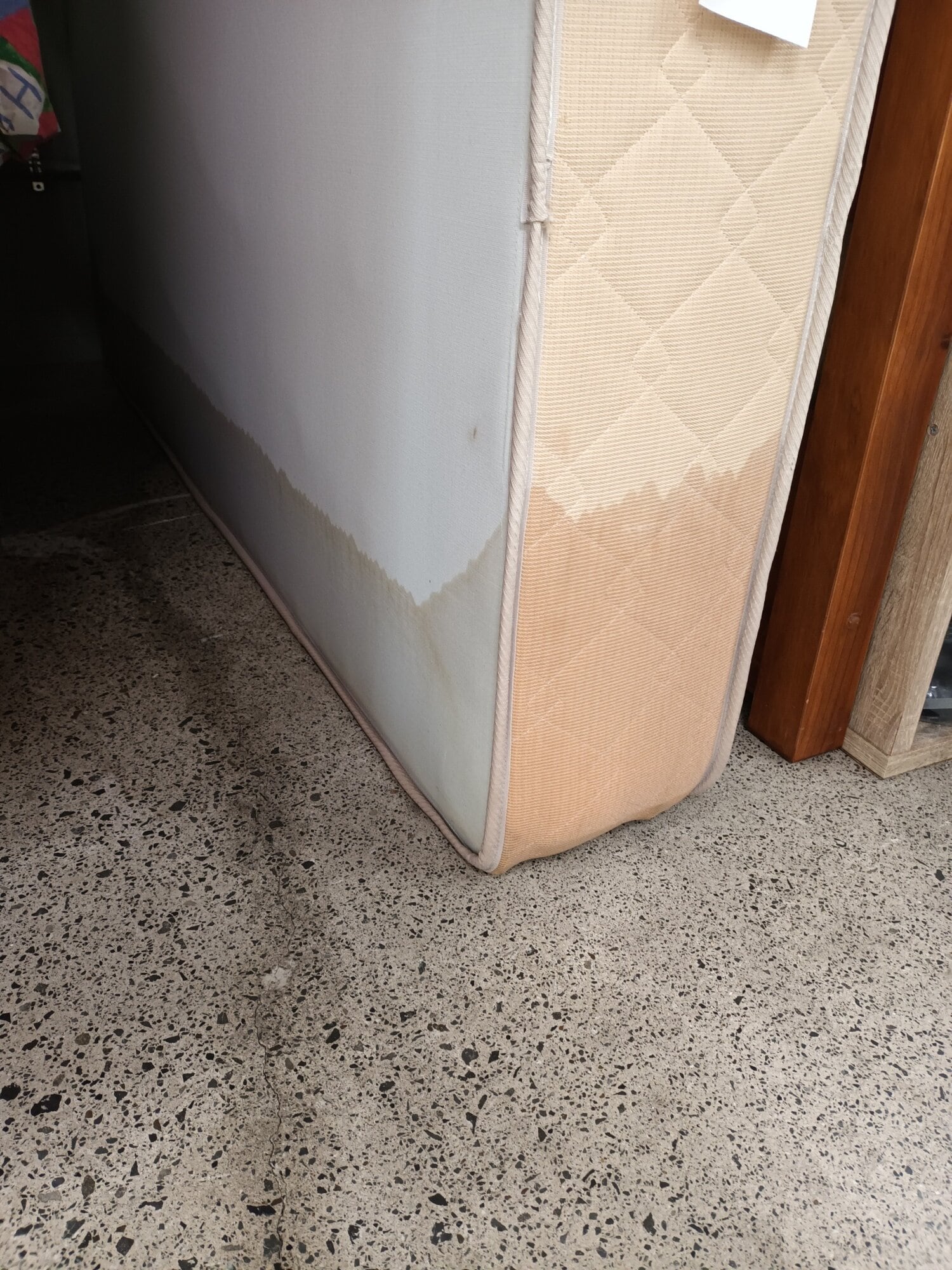  Beds stack sideways on the shop floor were damaged by water and had to be dumped. Photo / Supplied