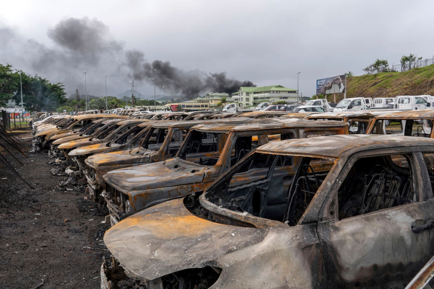 Burnt cars are lined up after unrest in Noumea, New Caledonia. Photo / AP