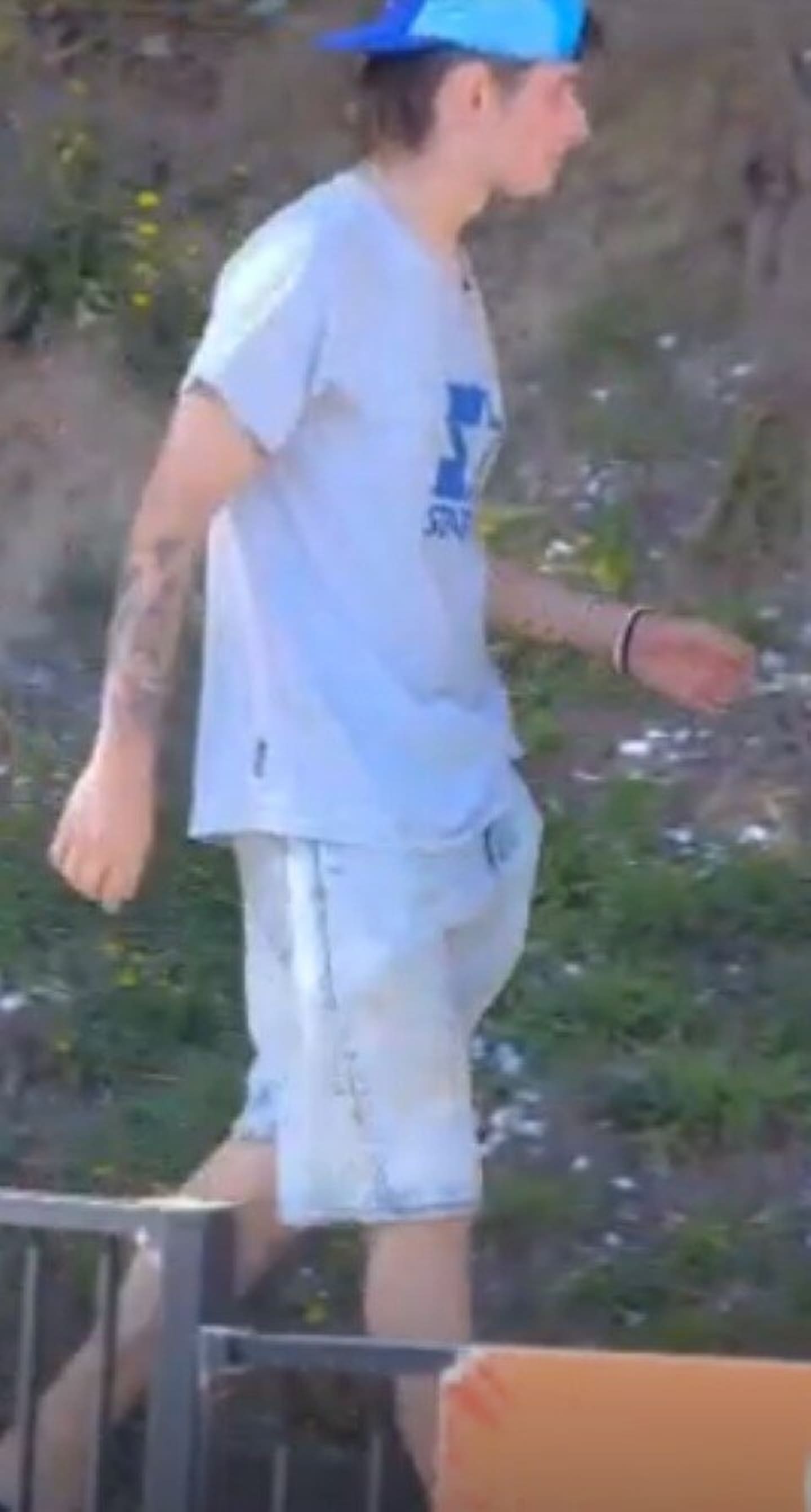 Police would like to speak to this person, along with another two people. Photos / NZ Police