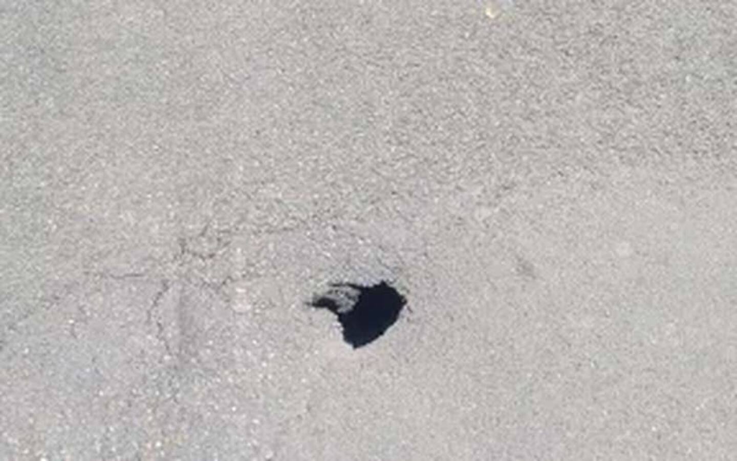 The small sinkhole which recently appeared in the middle of Halifax St East, Nelson. Photo / John-Paul Pochin