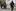 Policemen run for cover from shooting as another one aims his weapon during an operation against drug traffickers in Vila Cruzeiro slum, Rio de Janeiro, Brazil. Photo / AP