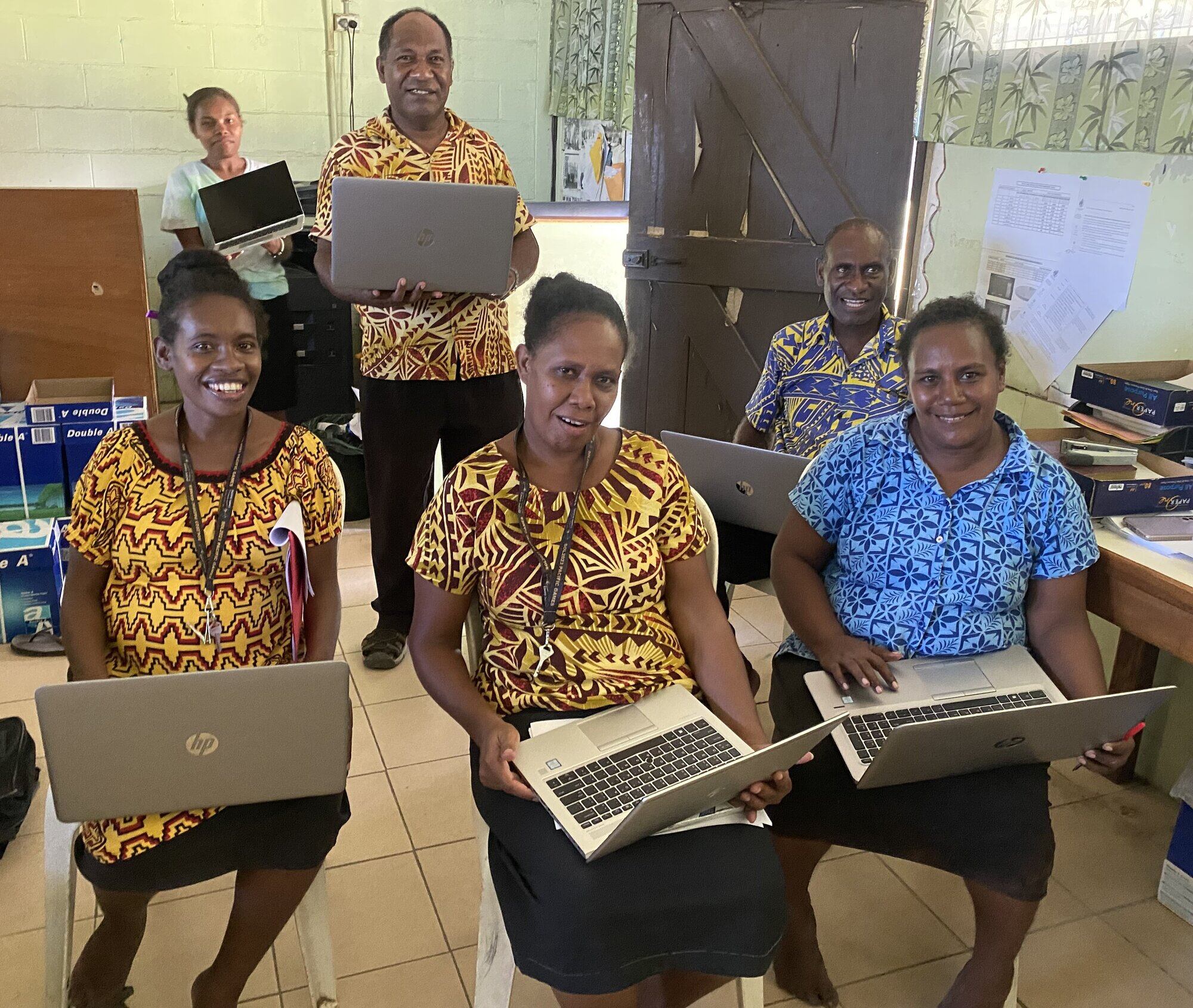 Students at Florence Young School, Kulum, in the Solomon Islands, with their donated laptops. Photo / Supplied