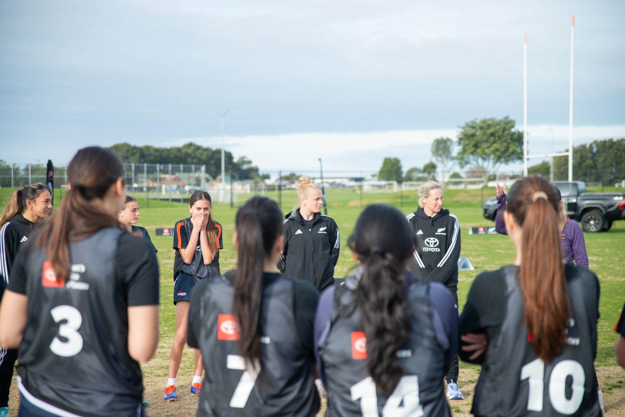  Students learning skills and drills from the Black Ferns. Photo / Toyota