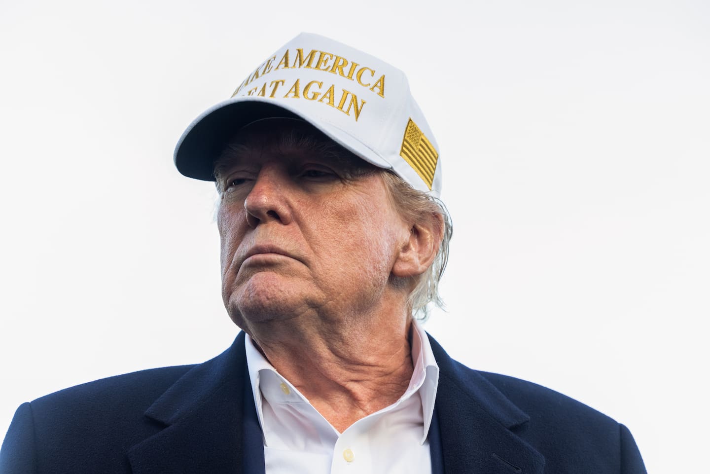 Protesters outside the event held signs saying 'stop crypto corruption.' Photo / Bloomberg via Getty Images