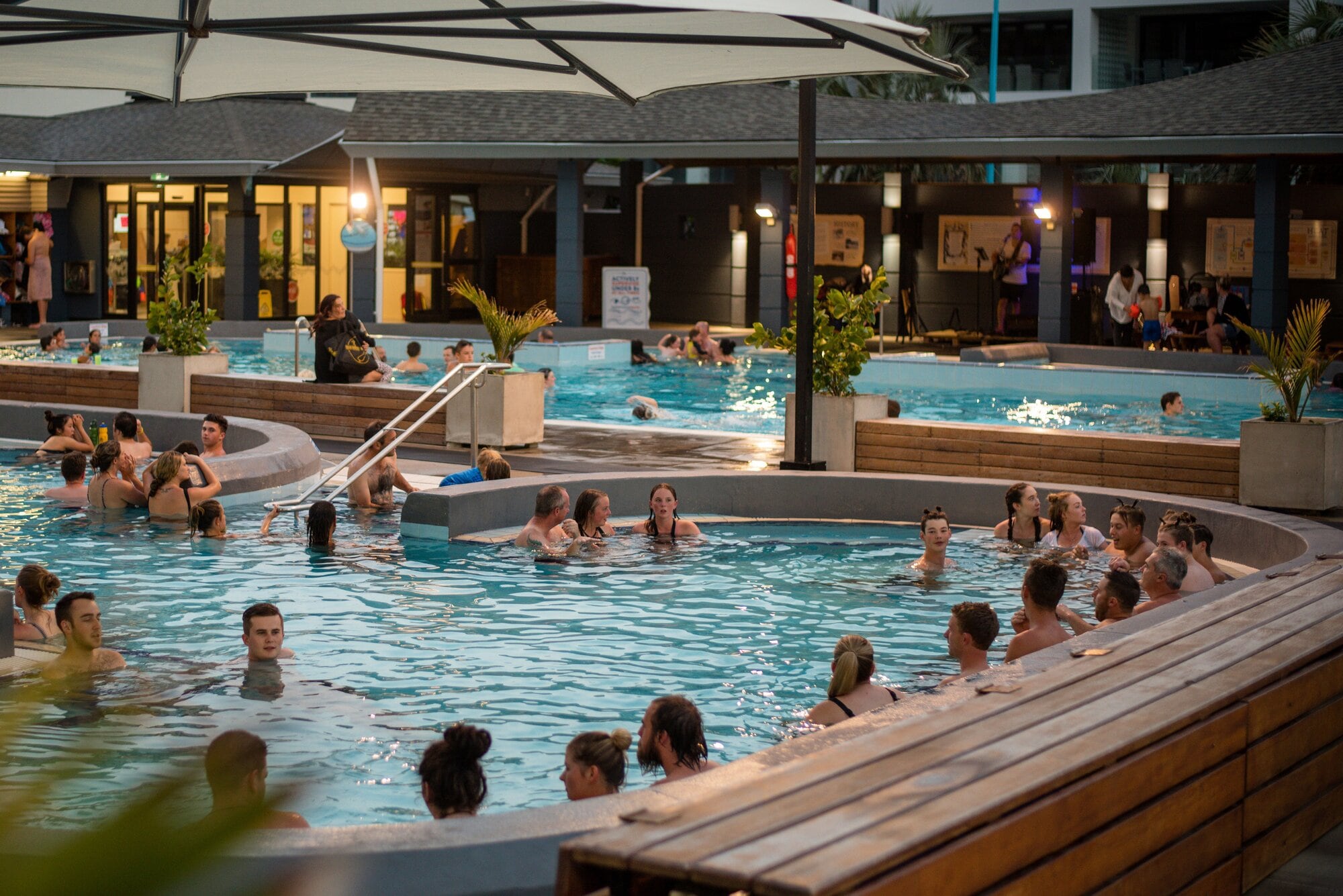  Mount Hot Pools visitors enjoying the ambience of Soak&rsquo;n Sounds.
