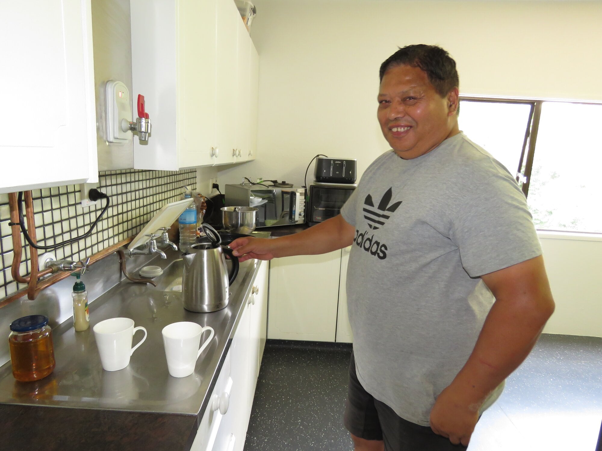 Piripi Paraeana where he makes a real difference in the kitchen, drawing youth out of their shells with kai and a cuppa. Photo / Merle Cave