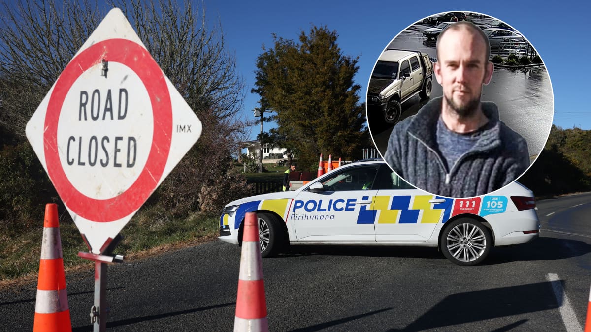 Fugitive Tom Phillips shot dead, officer shot in head during stand-off, 2 children still missing