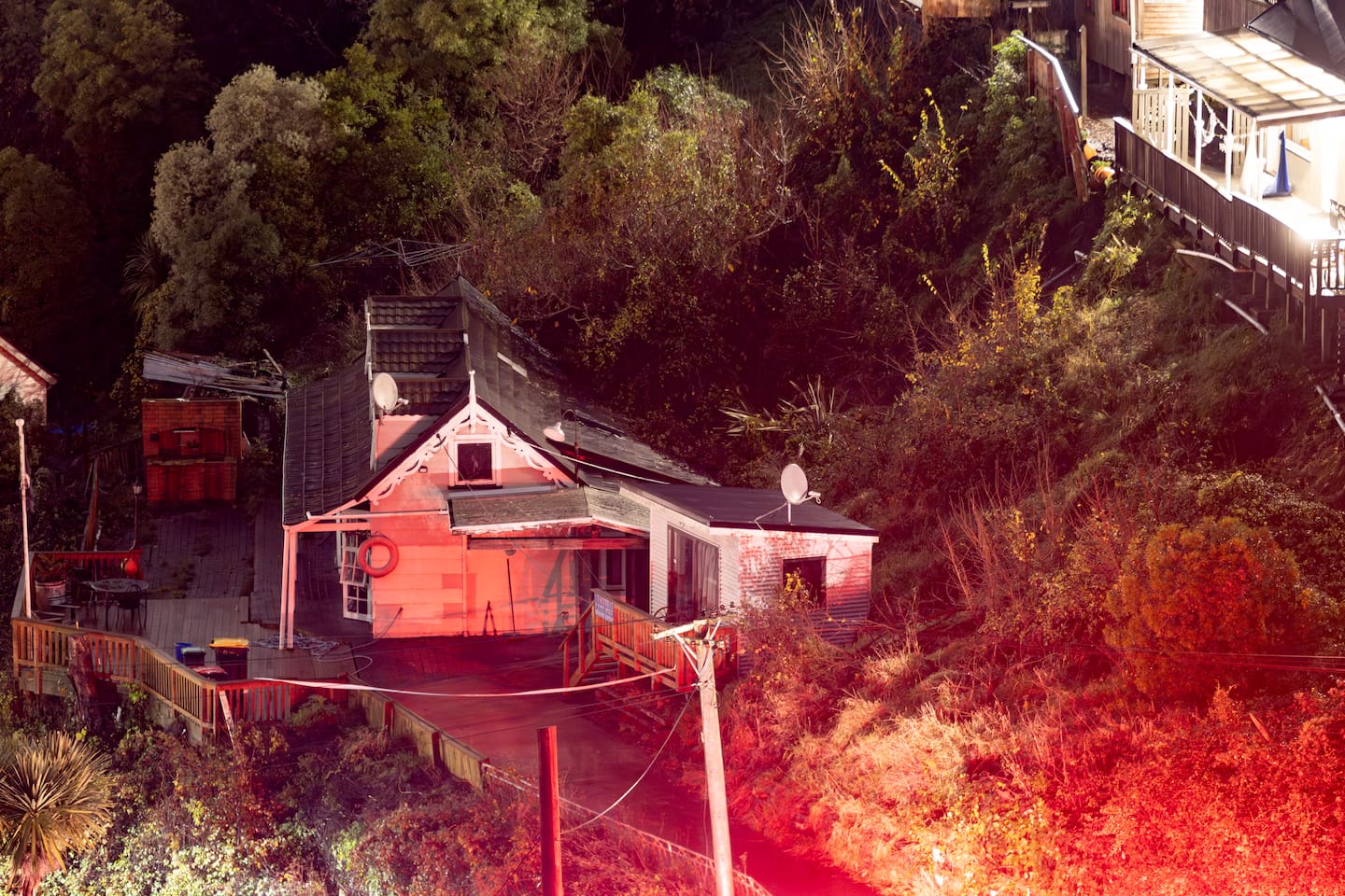 Residents in two Lyttelton homes were evacuated last night after one was hit by a slip. No one was hurt in the incident. Photo / George Heard