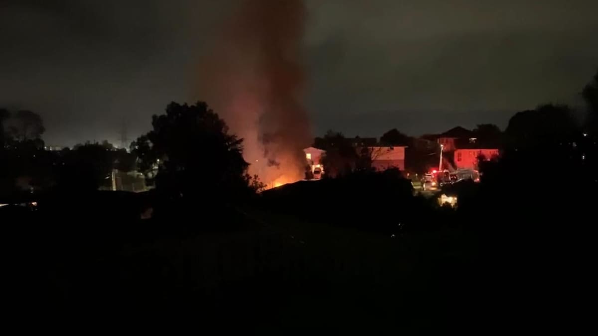 Watch: Flames shoot into air as fire engulfs Auckland home, one treated for smoke inhalation Watch: Flames shoot into air as fire engulfs Auckland home, one treated for smoke inhalation