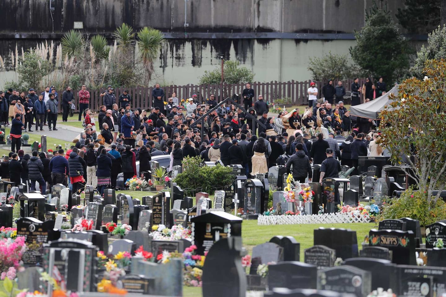 Mourners gather at Waikumete Cemetery in Auckland to farewell MMA fighter Fau Vake. Photo / NZME