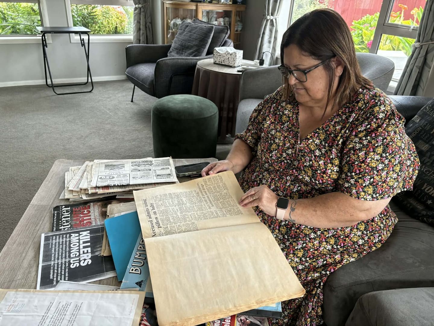 Lauree Ashworth has kept years of clippings and information about her son's death – and his killer. Photo / Anna Leask