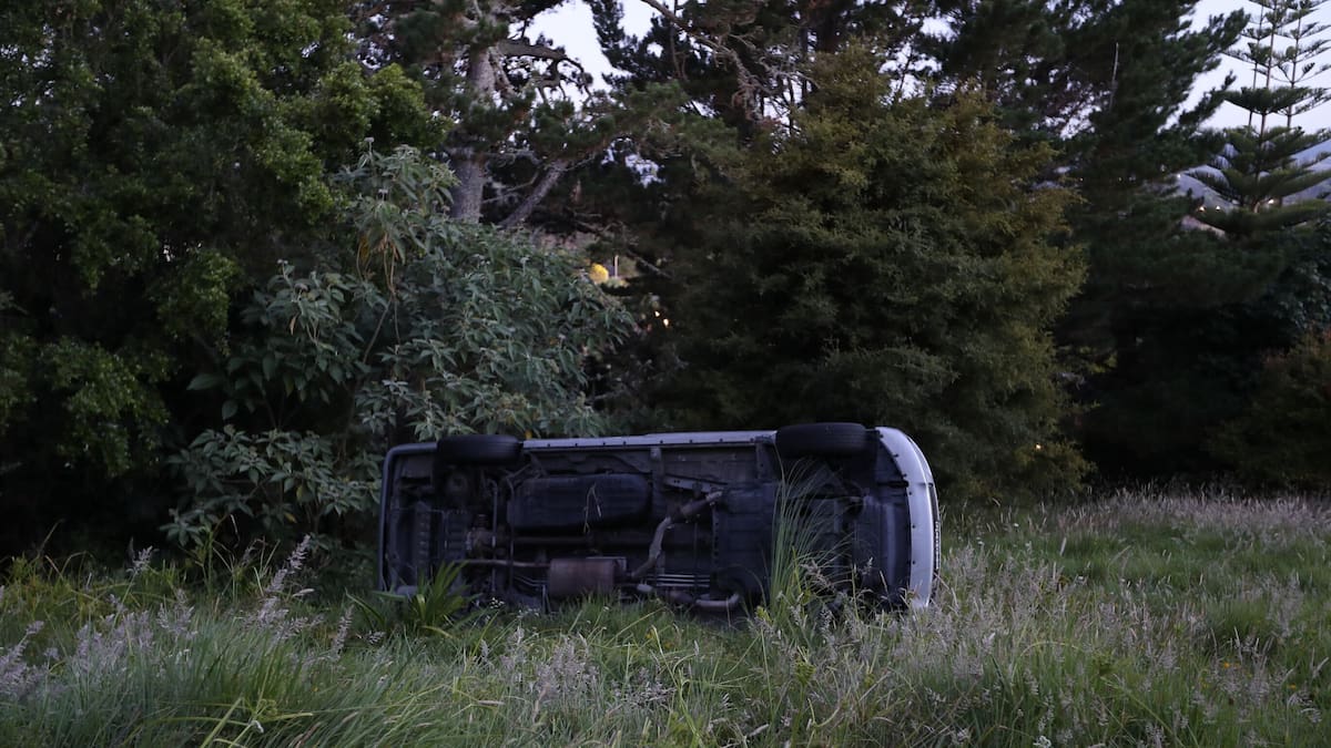 Four arrested after car rolls down bank fleeing Auckland burglary Four arrested after car rolls down bank fleeing Auckland burglary