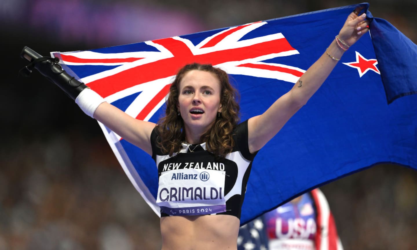 Anna Grimaldi of New Zealand celebrates winning gold in the Women's 200m - T47 . Photo / Getty Images