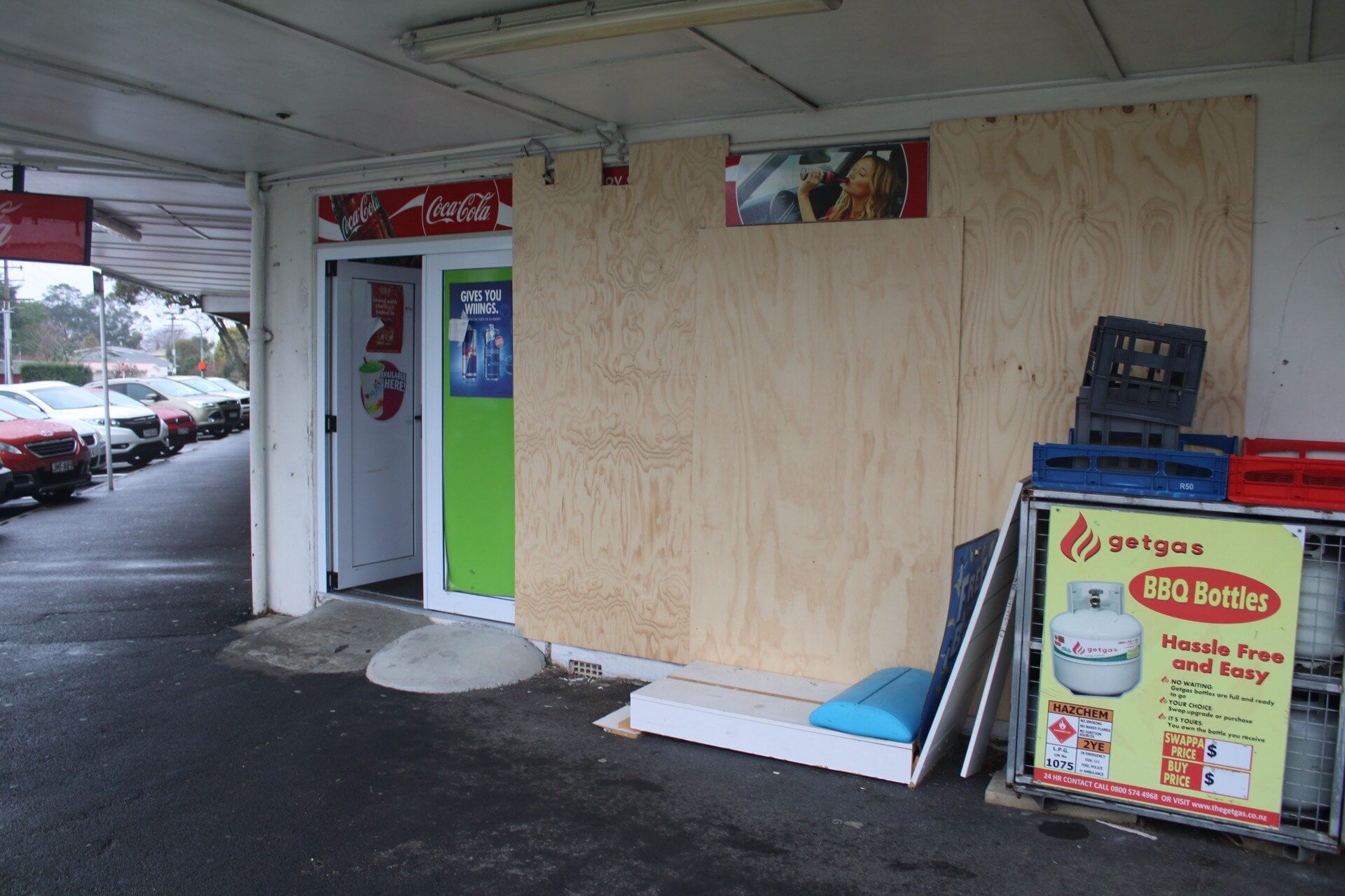 The front of the store will require rebuilding, and in the meantime, it is boarded up. Photo / Ayla Yeoman
