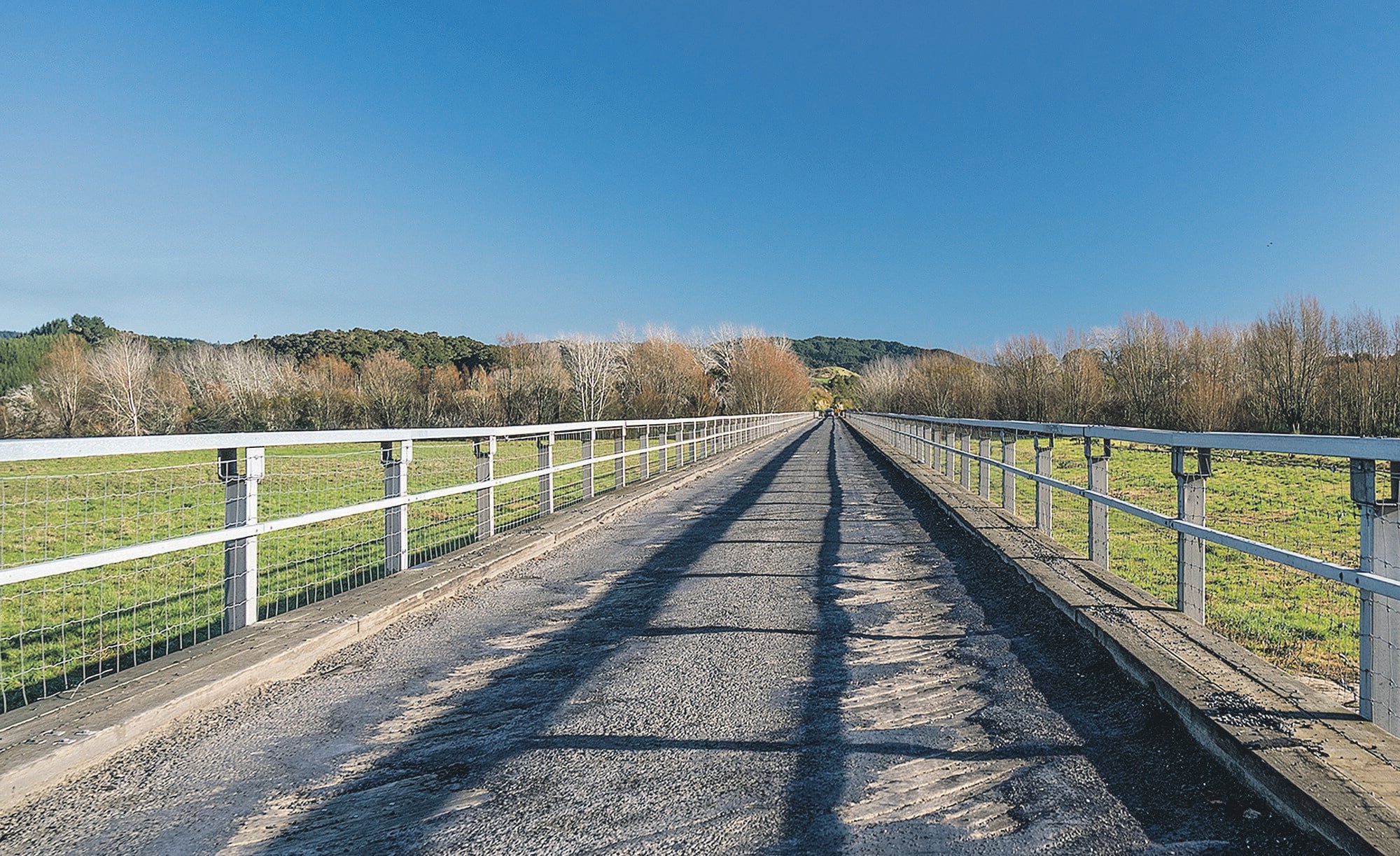  The asphalt over wooden boards on the deck of the Pekatahi Bridge begins to deteriorate within days of undergoing repairs. Photo / Troy Baker