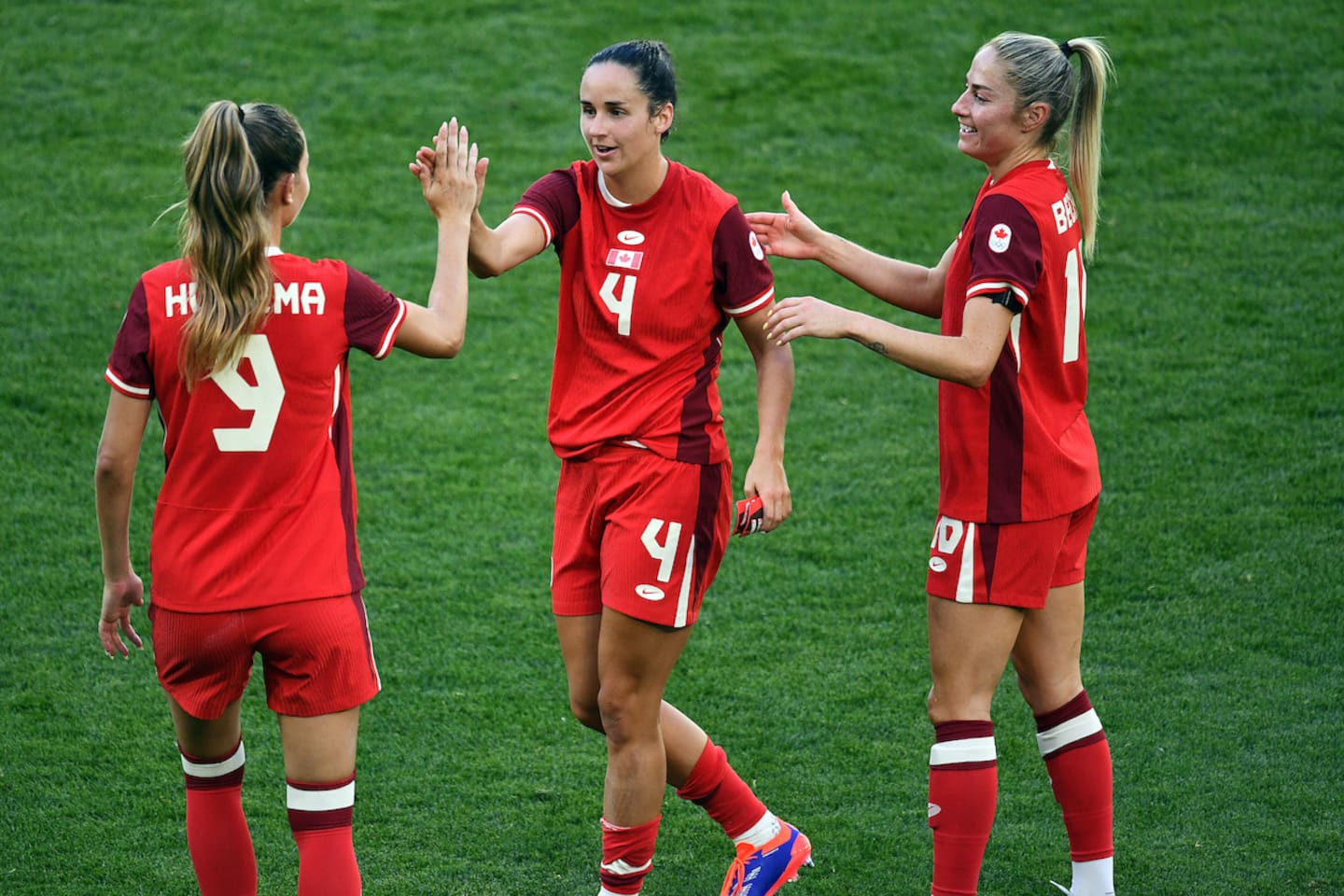 Canada players celebrate their Paris Olympics win over New Zealand. Photo / Photosport