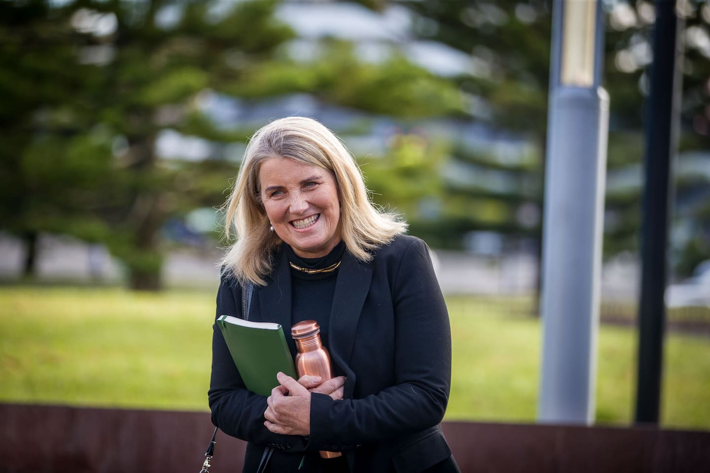 Liz Gunn was all smiles outside court during her trial but broke down in tears in the witness box when footage of her arrest was played. Photo / Michael Craig