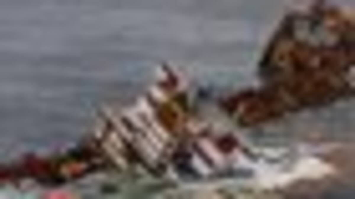 'Smashed' containers airlifted off Rena by powerful chopper - NZ Herald