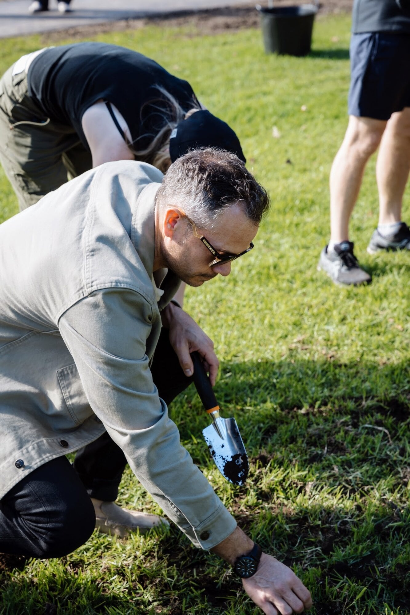 Bay of Plenty EVES general manager Mark Leach planting a daffodil bulb at Yatton Park in 2025. Photo / Supplied