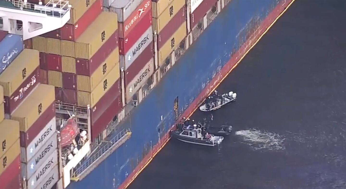 FBI agents boarding the cargo ship Dali in Baltomore on Monday. Photo / AP