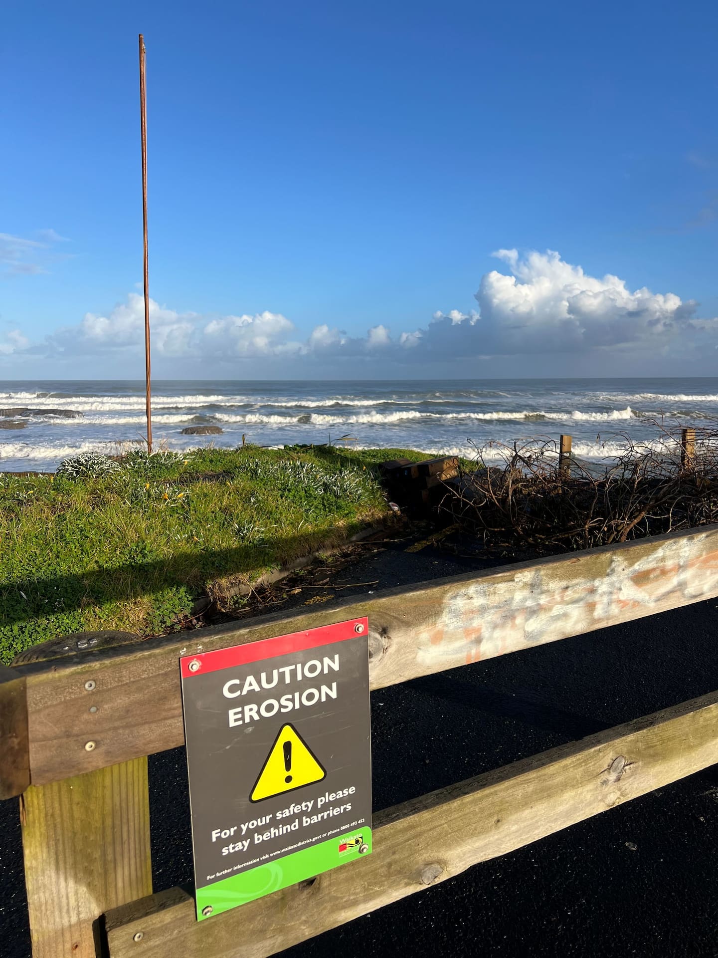 Warning signs at Port Waikato's Sunset Beach. Photo / Malisha Kumar