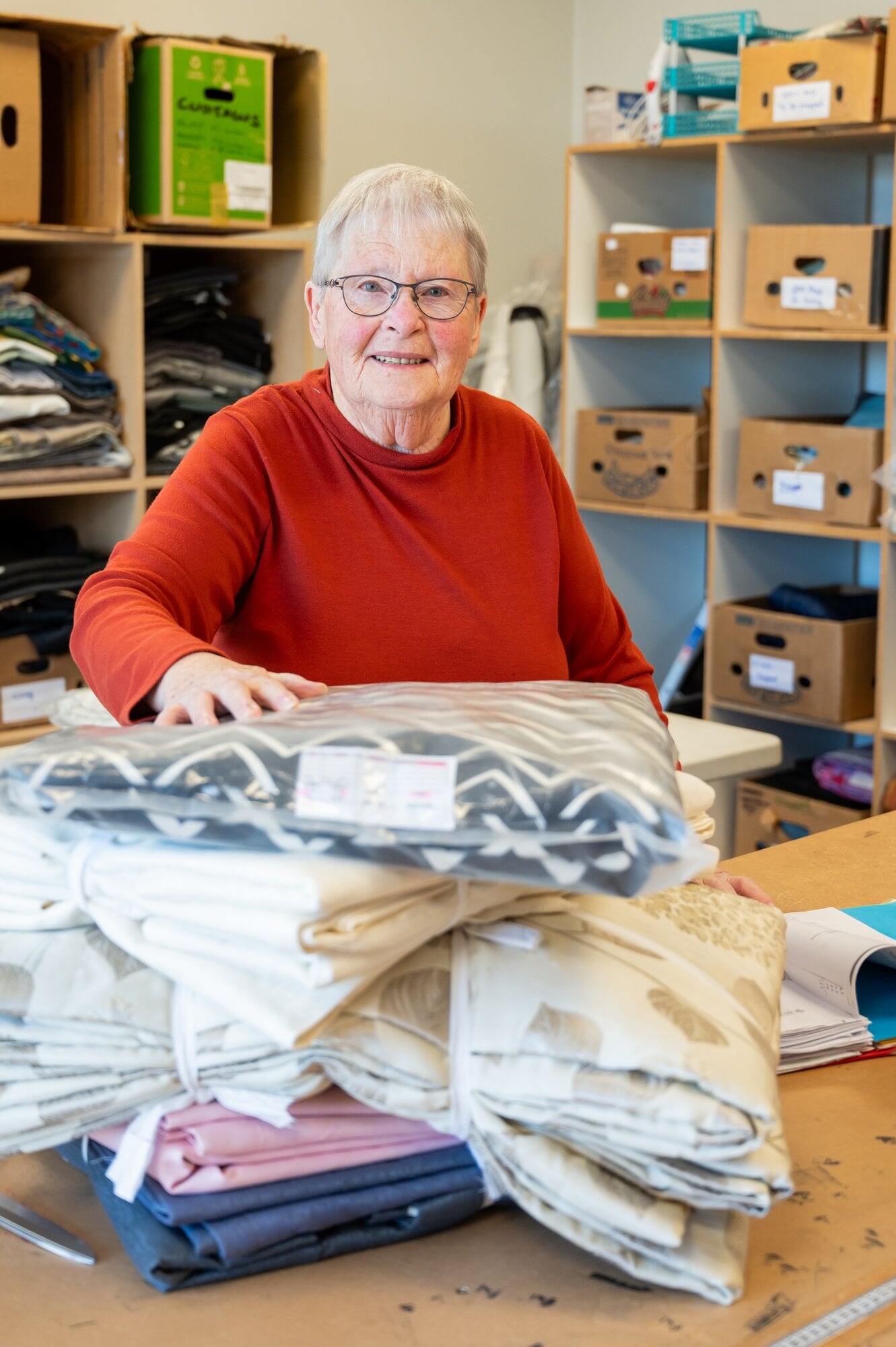 Ann Letheren volunteering at Tauranga Curtain Bank. Photo / Brydie Thompson