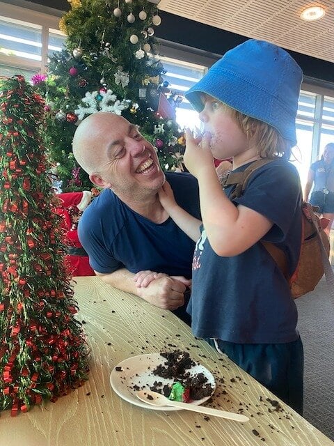 Adam Sears with son Raife at RMHC during Christmas. Photo / Supplied