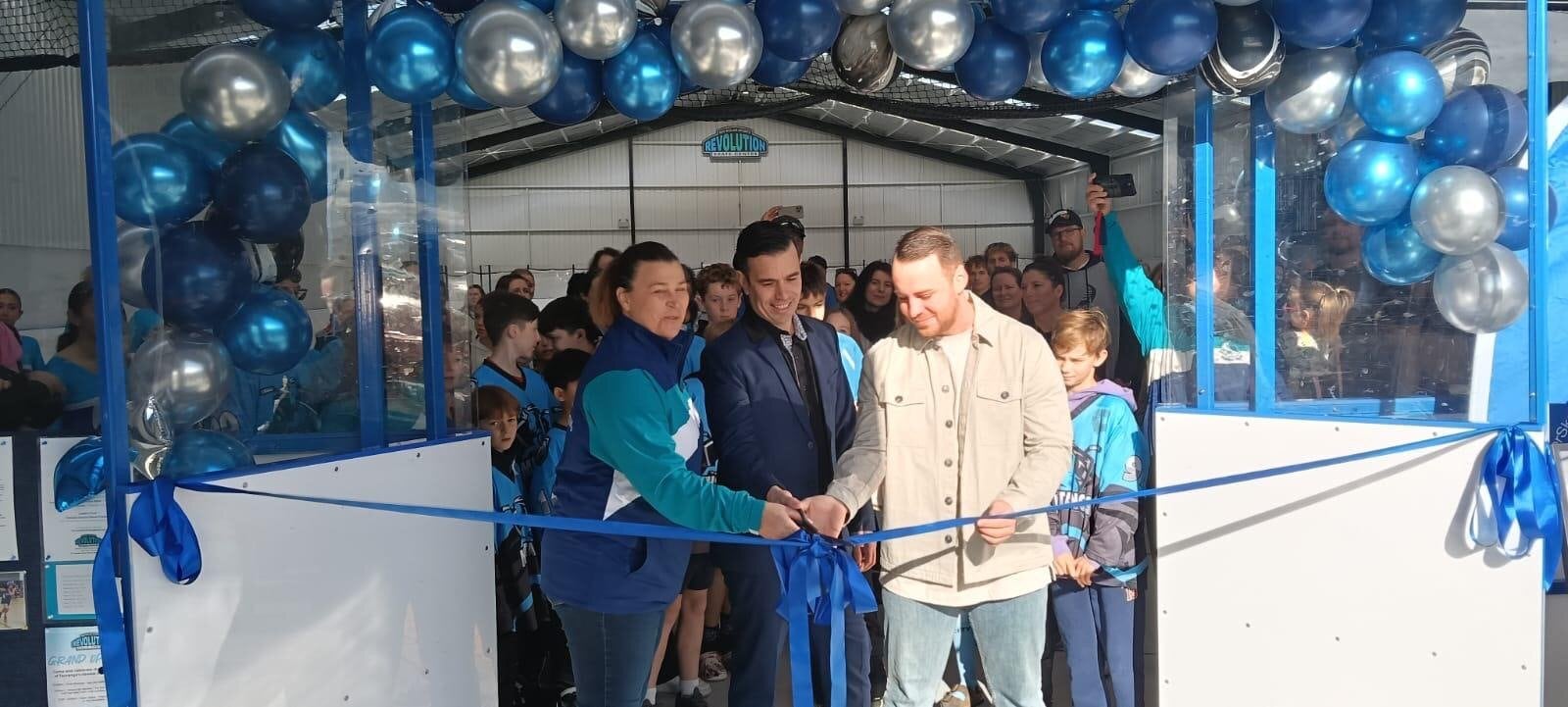 Tauranga Roller Skating president Jackie Evans, Bay of Plenty MP Tom Rutherford and Mount Mustangs club president Joel Coppins cutting the ribbon at the official opening of Revolution Skate Centre at Mercury Bay Park. 