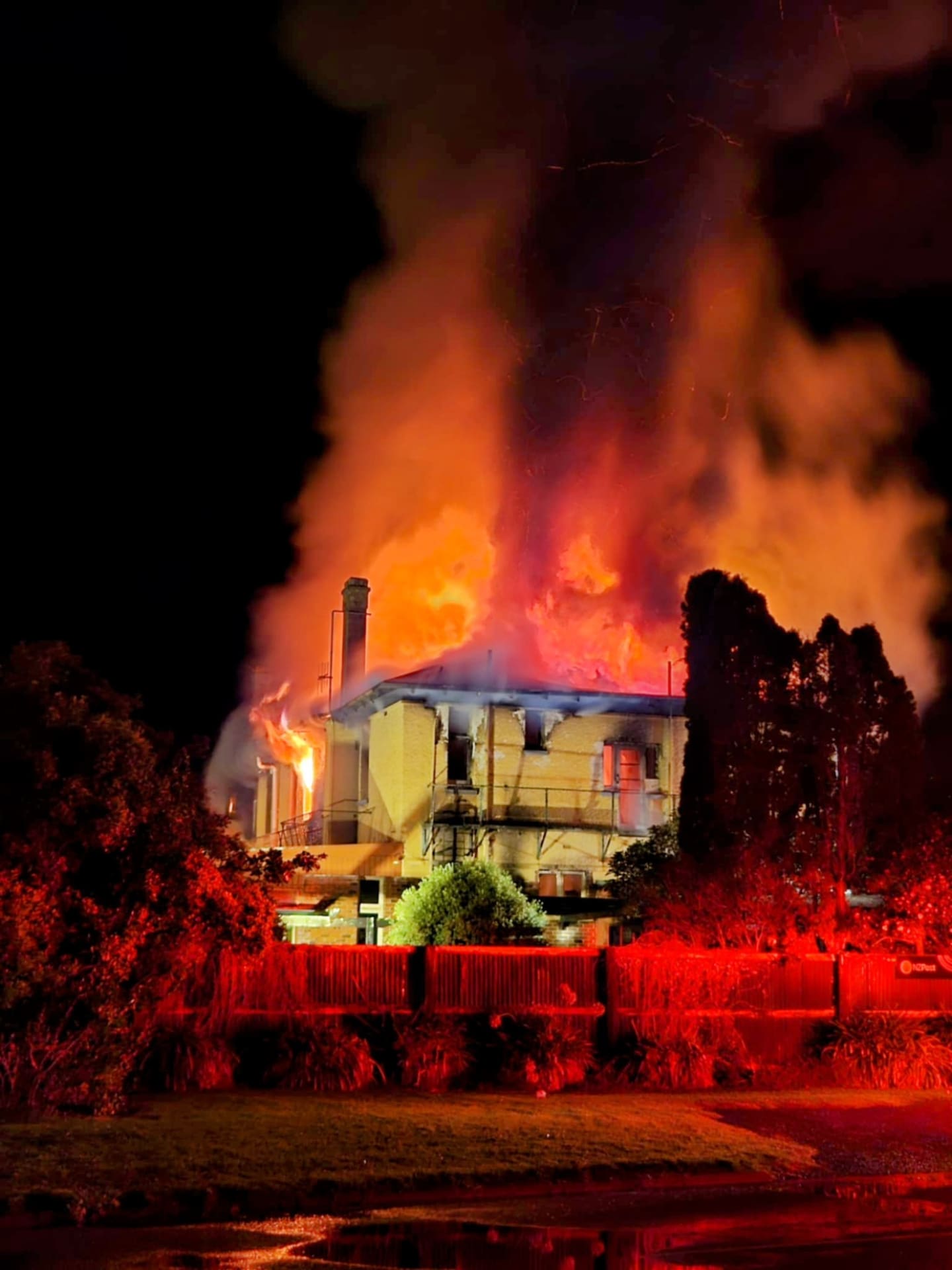 More than 20 appliances are responding to the fully involved Waitotara Hotel Fire that broke out about 6pm. Photo / Jay Preeter