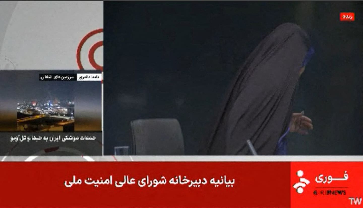 An IRINN news broadcast on June 16 was cut off after a loud explosion struck Iran’s state TV building during a live report. The presenter was seen fleeing the smoke-filled room. Photo / IRINN, AFP