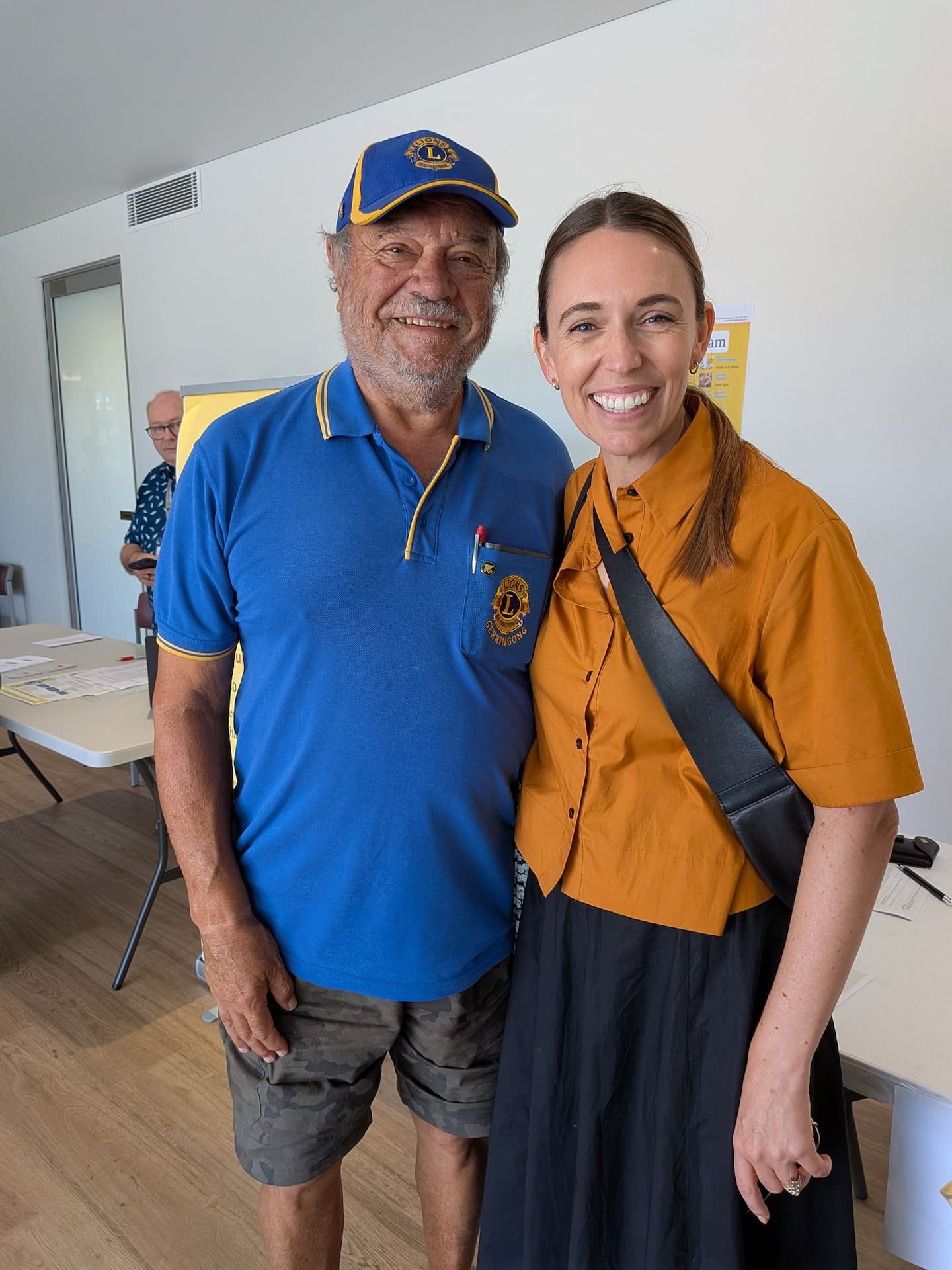 Ardern poses for a photo with a local in Gerringong.
