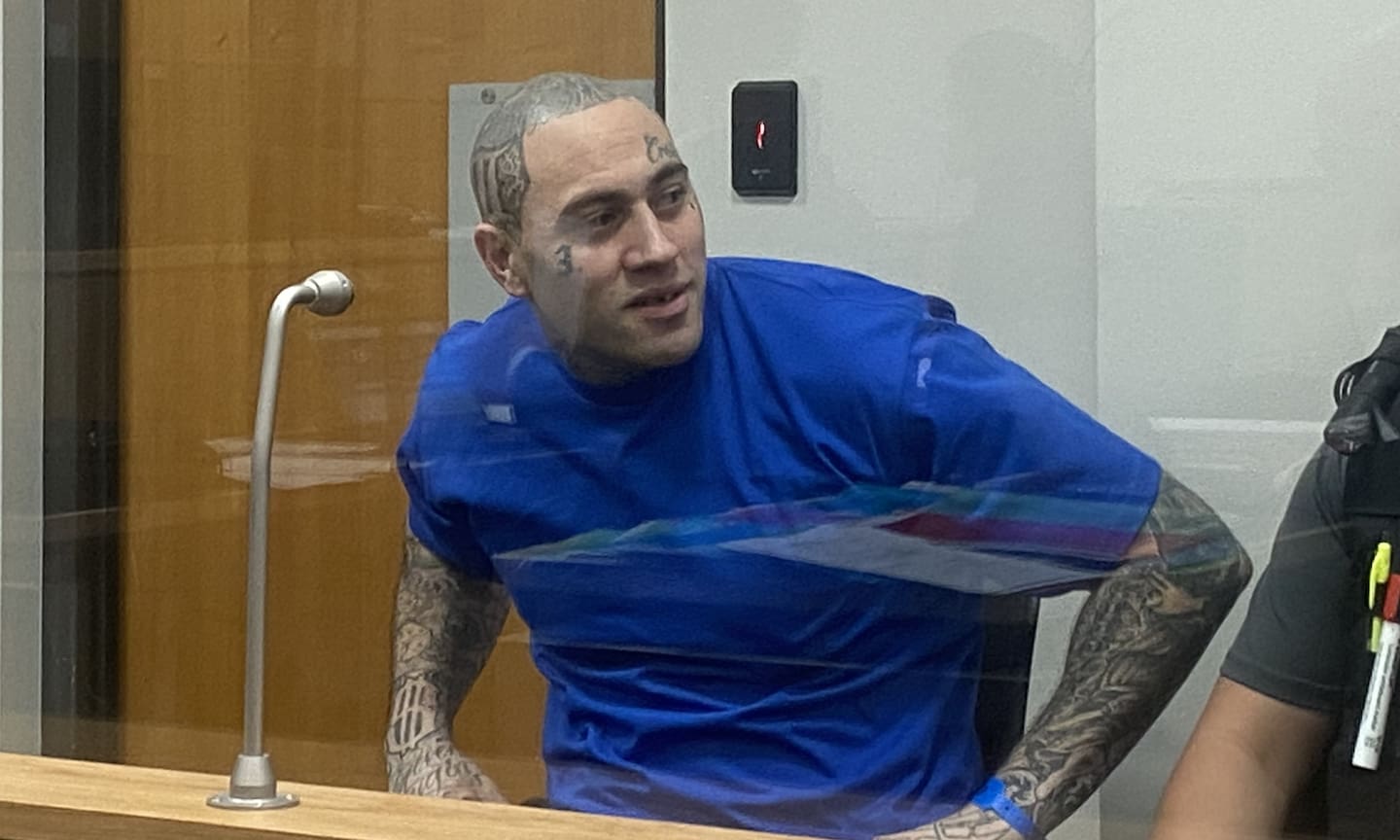 Crips gang member Jayden Popata appears in Auckland District Court after pleading guilty to the armed robbery of a Pt Chevalier, Auckland bar, a prison stabbing and a prison escape. Photo / Craig Kapitan