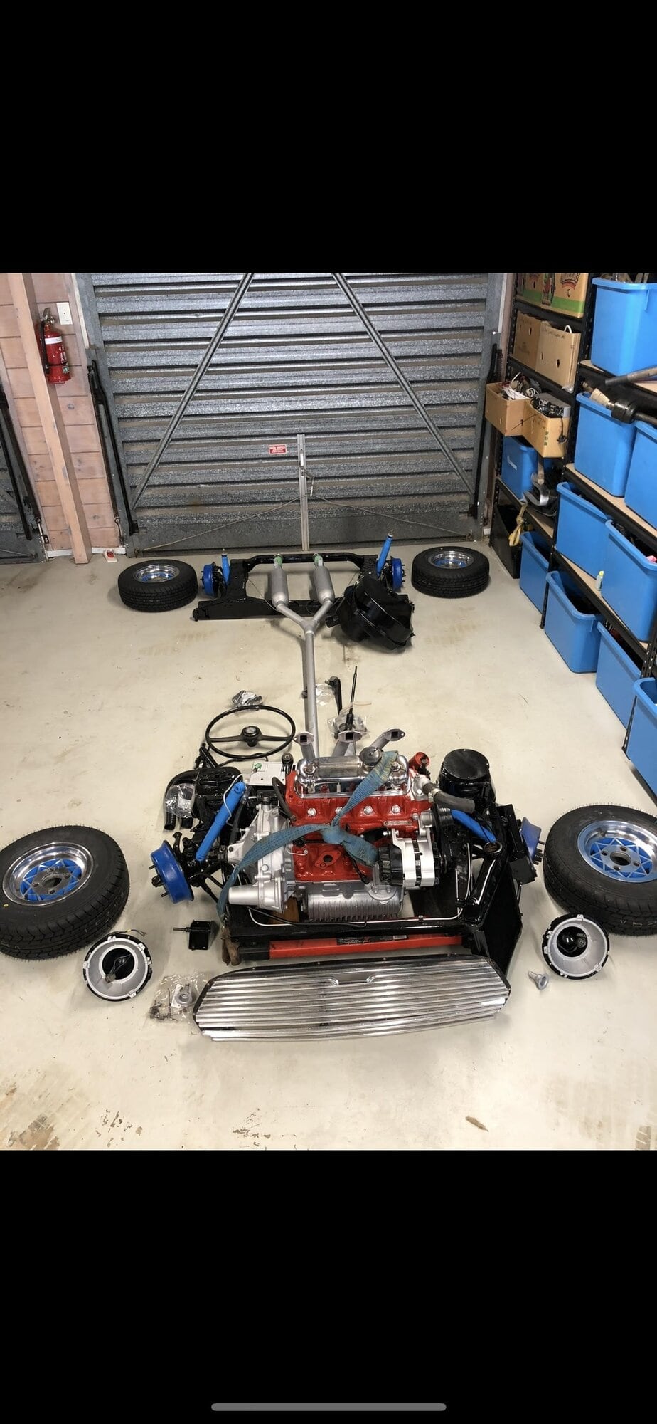  The car parts spread out in the shed as the Suttons worked on the Mini Morris during lockdown in 2020.  Photo / Supplied