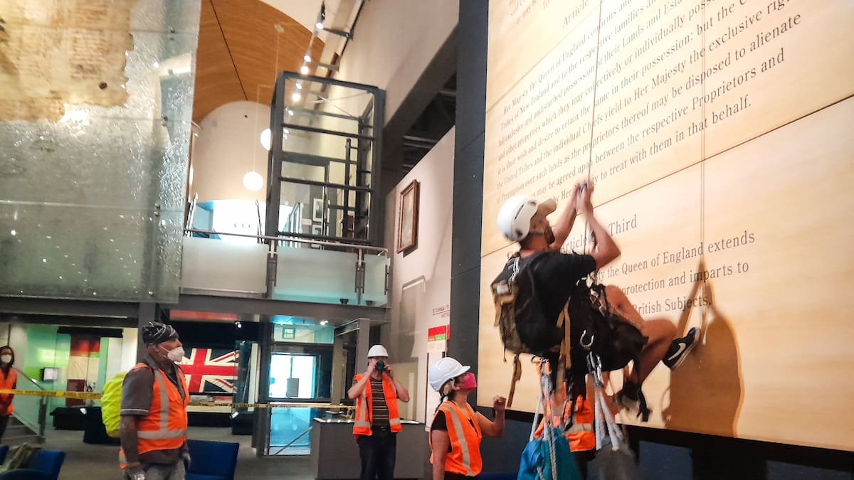Twelve arrests after protesters abseil inside Te Papa, deface Treaty of ...