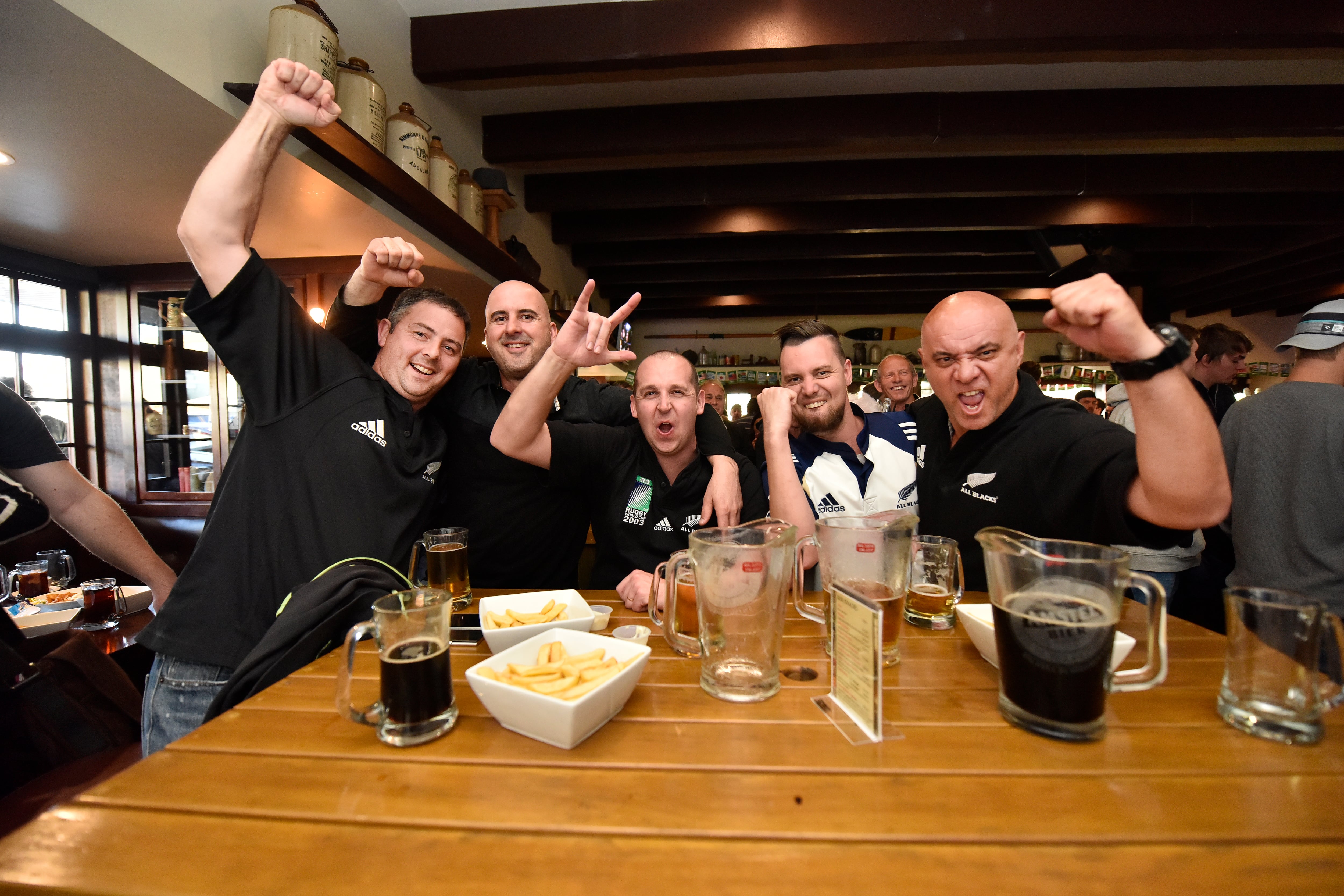 Rugby fans celebrate an All Blacks victory at Cornerstone Bar in 2015. Photo / George Novak