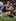 Greg Inglis of the Maroons is wrapped up in a tackle by Trent Waterhouse of the Blues during game three of the ARL State of Origin series between the Queensland Maroons and the New South Wales Blues at Suncorp Stadium on Jul