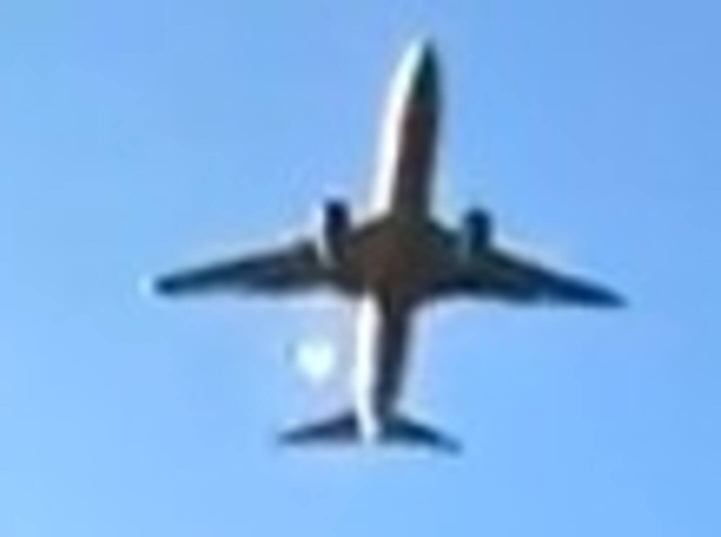 This photo shows an abnormal flame coming out of the right engine of the Jeju Air Boeing 737-800 as it comes to land before crashing and bursting into flames at Muan International Airport in South Jeolla Province,