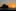 The sun sets behind Lion Rock. Photo / Justine Tyerman