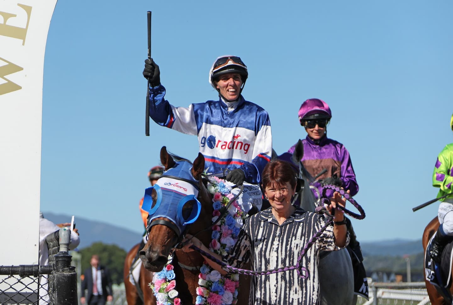 A delighted Kate Hercock salutes the judge as she brings Manzor Blue back at the head of the field following their upset win in last Saturday’s Wellington Cup.