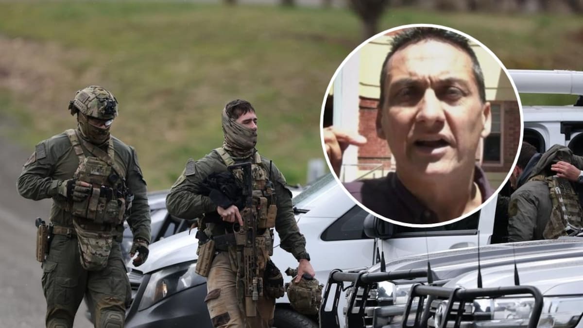 Australian police swoop on home in search for alleged cop killer Dezi Freeman