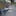 Blast from the past: The photos, taken by the Google car in 2013, a familiar figure shows the woman stroking the hair of a man lying with his head in her lap. Photo / Google Maps


