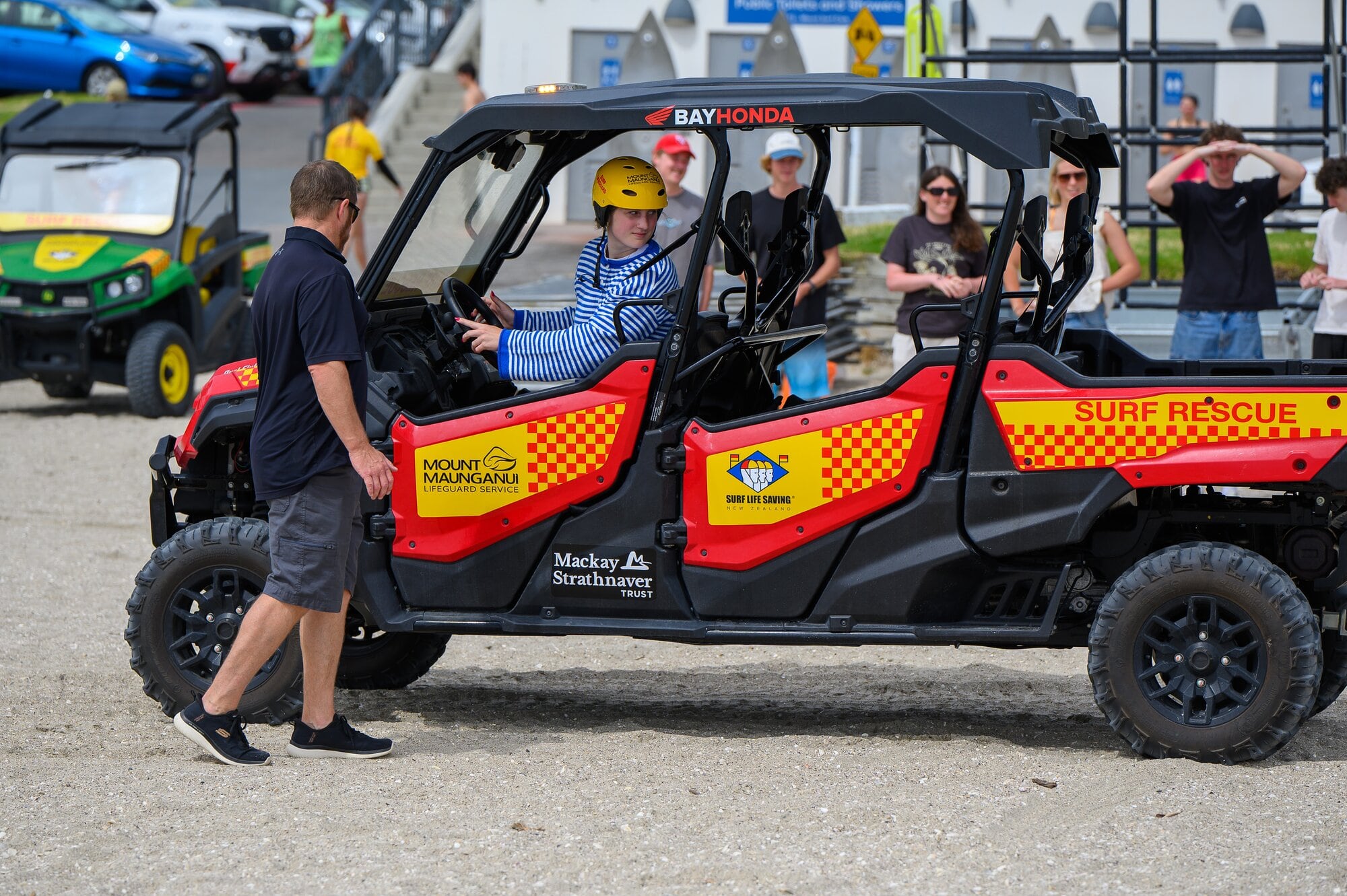 Isla Petherbridge behind the wheel of the Mount Maunganui Lifeguard Service’s ATV during the two-day training at Mount Maunganui Main Beach. Photo / David Hall