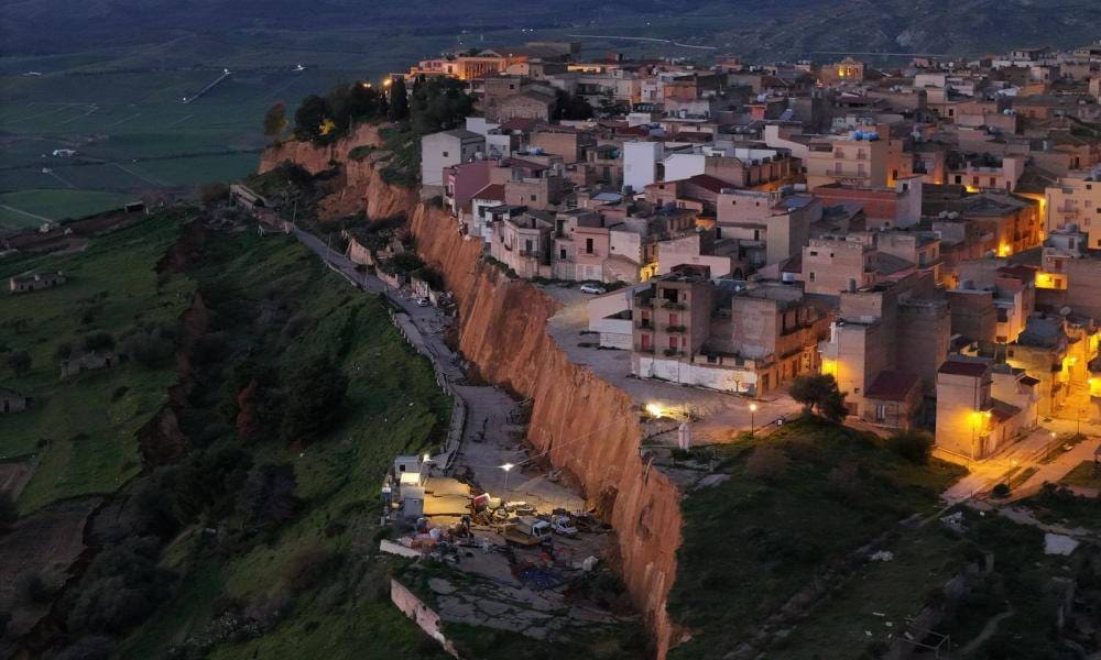 More than 1000 people evacuated after cliff crumbles in landslide at Sicilian town