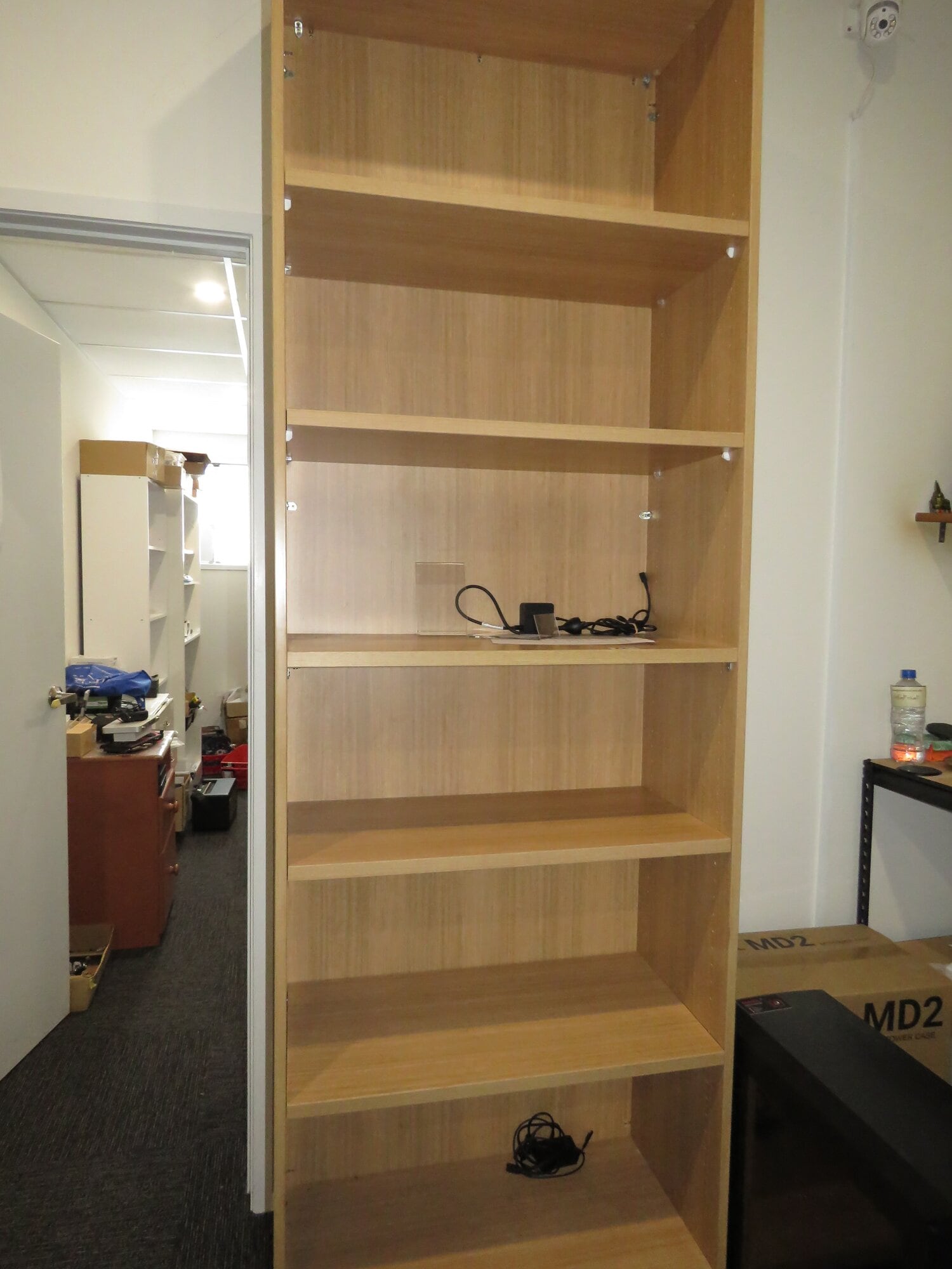 The shelf pictured was loaded with laptops for sale inside iFixed Ltd in Katikati, which were stolen in a burglary. Photo / Merle Cave