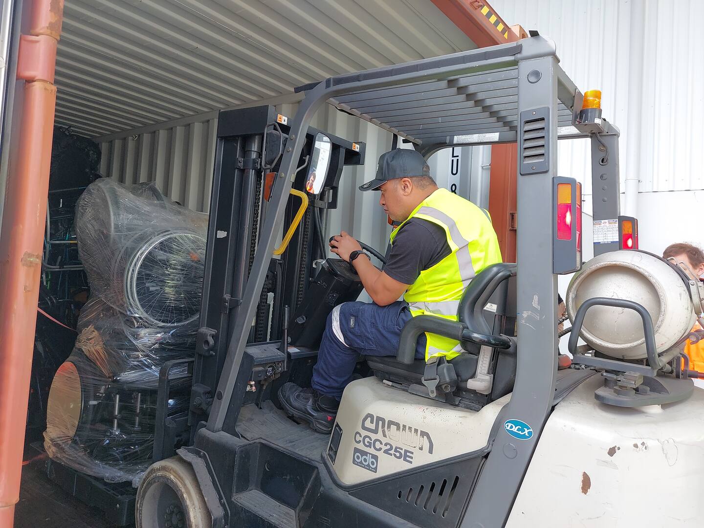 The wheelchairs were wrapped and loaded into a container bound for Ukrainian war hospitals.