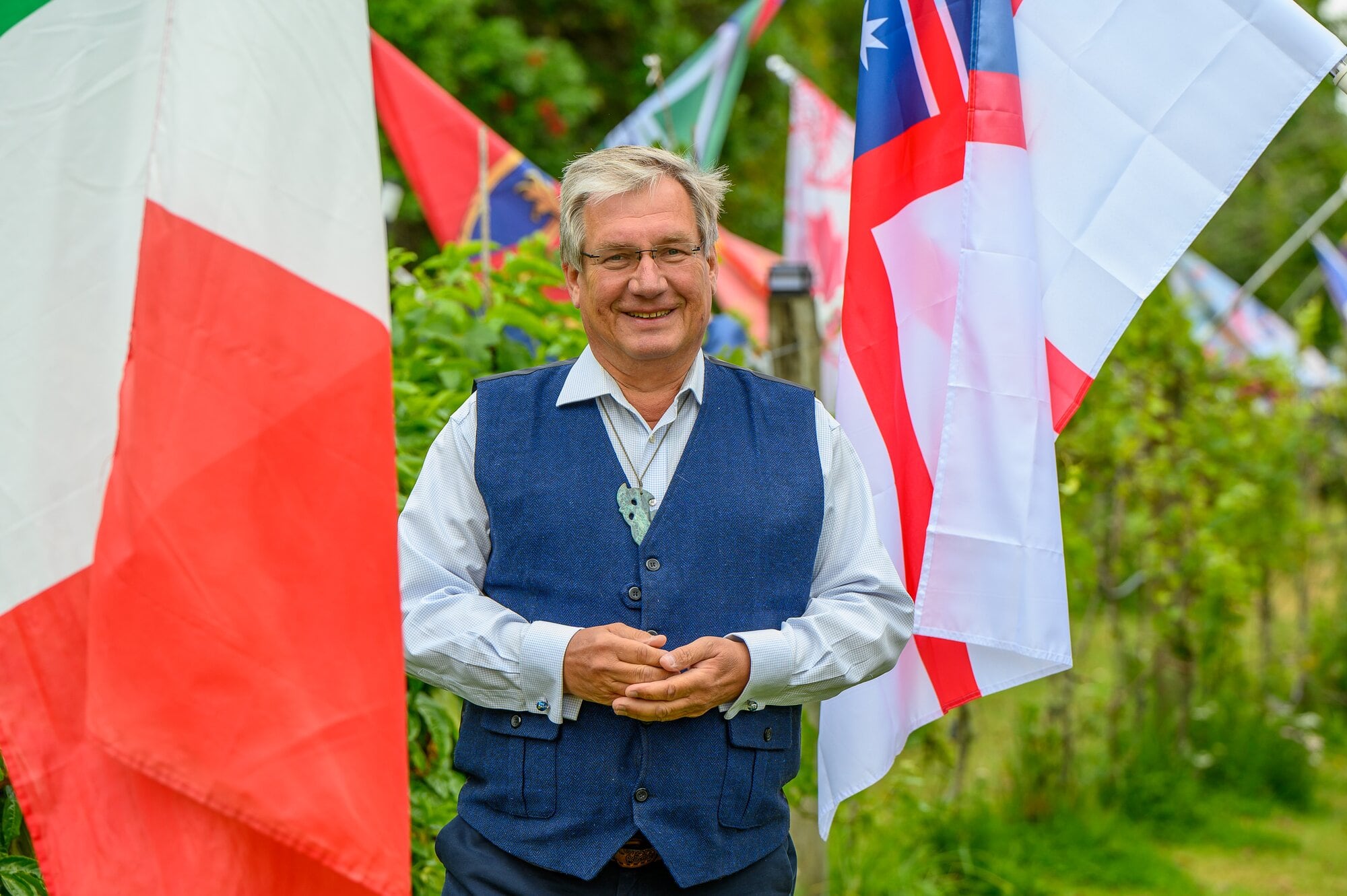 Jens Mueller's property features flags from around the globe. Photo / David Hall
