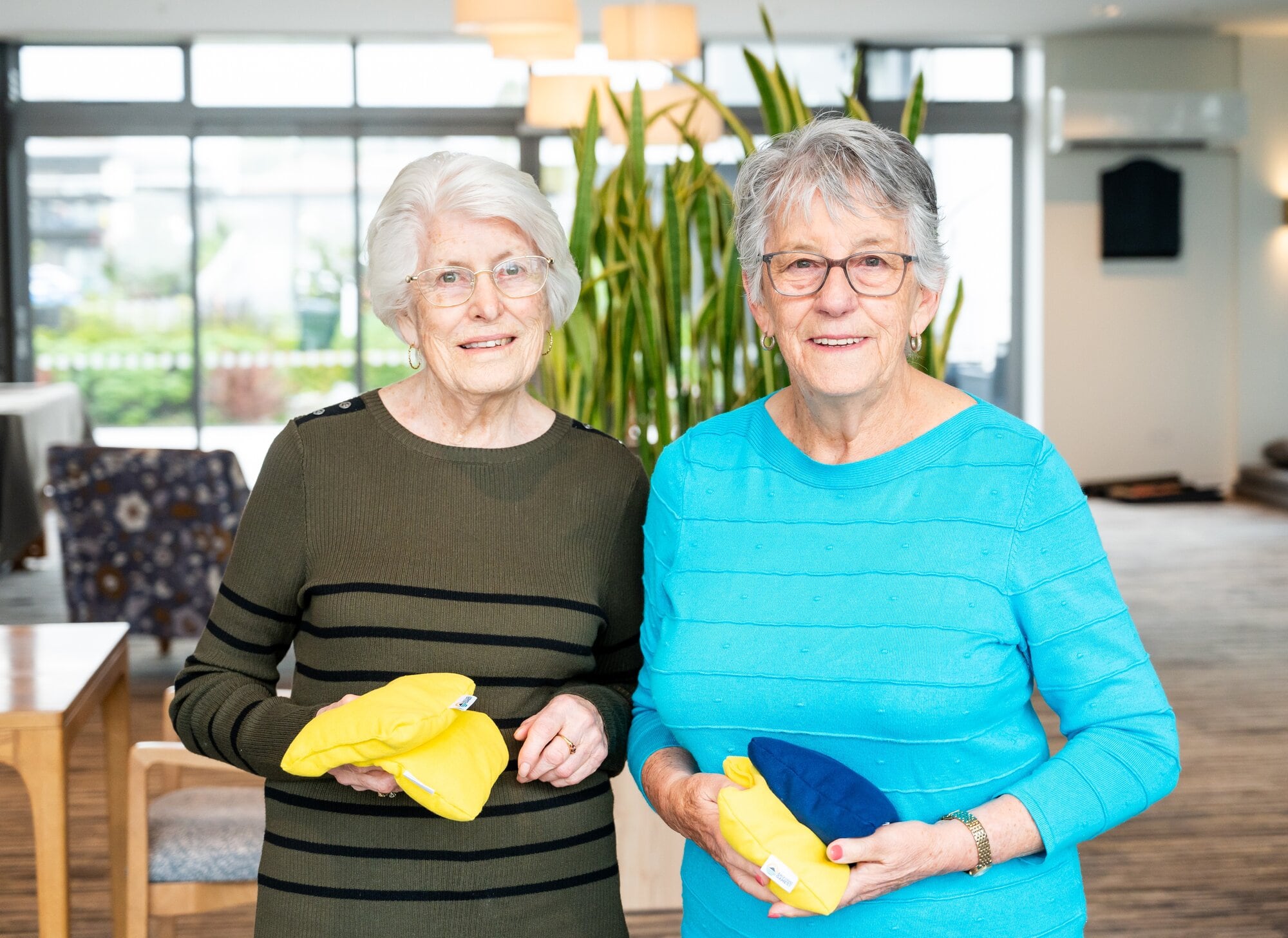 Val Harkness and Pat Purton  Bayview Village residents Val Harkness and Pat Purton reckon corn hole is great game.  Photo / Brydie Thompson
