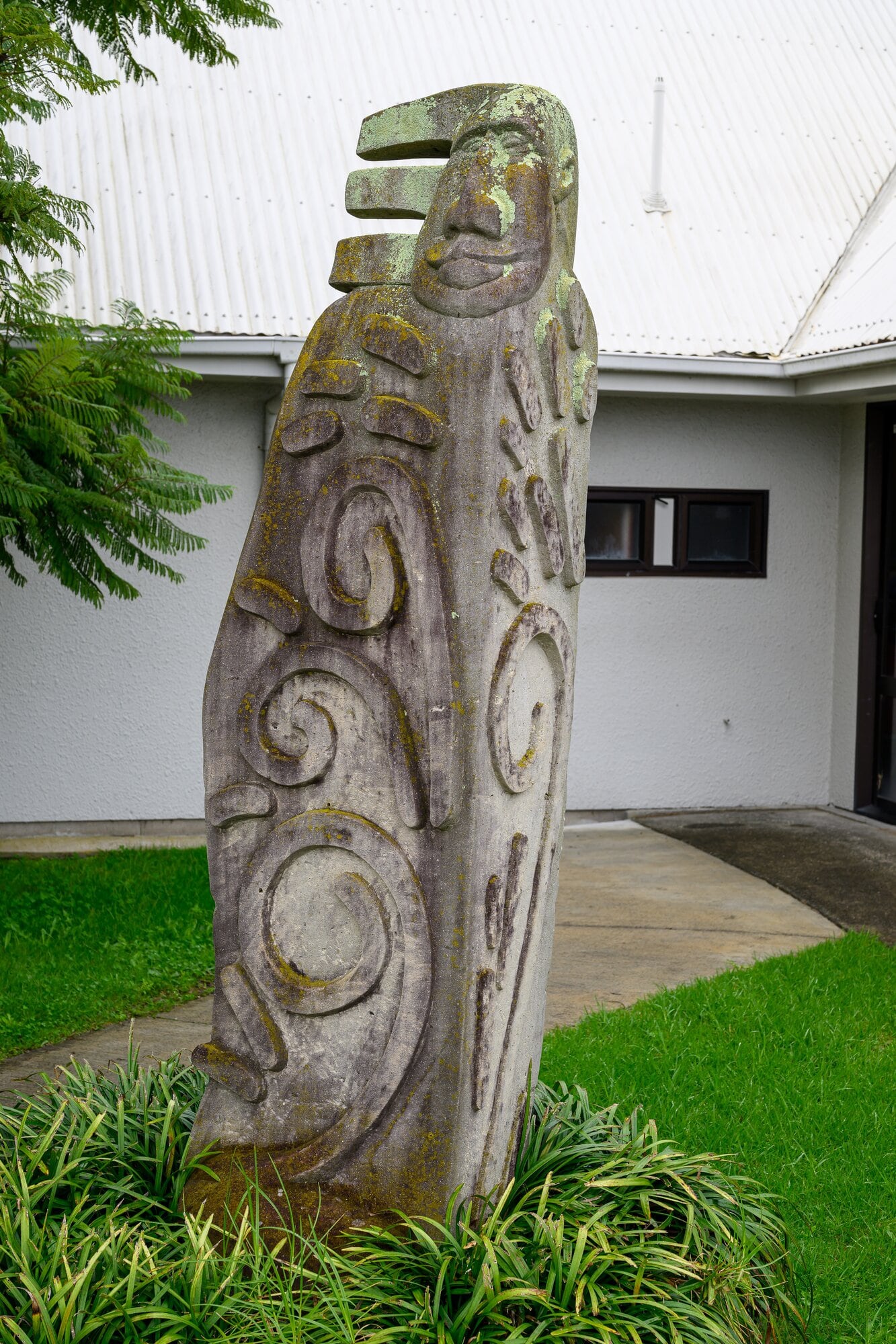 ‘Wairua’ a Hinuera stone and metal painted sculpture by Peter Crammond installed in 1989 stands three metres high in the grounds of the Hillier Centre. Photo/David Hall