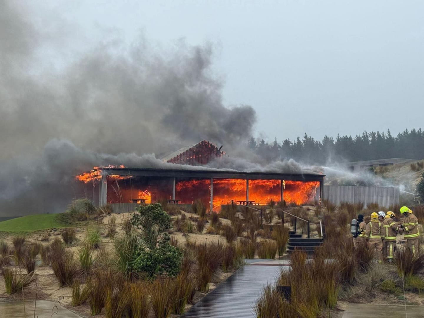 Fire engulfs Ric's Restaurant at Te Arai Links golf course.